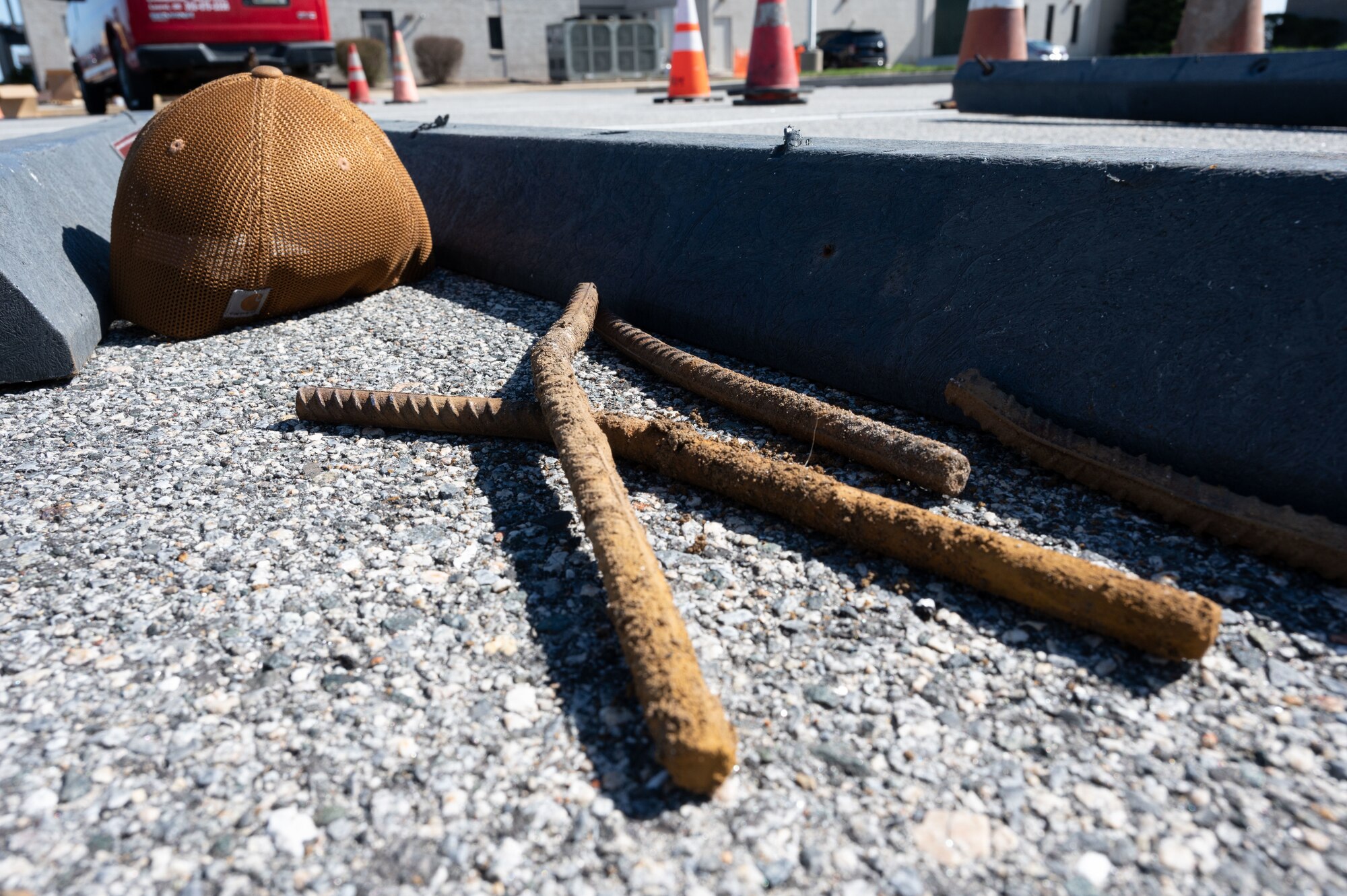Pieces of rebar sit on the ground during the installation of an electric vehicle charging station on Dover Air Force Base, Delaware, March 25, 2024. Team Dover’s switch to EV’s began in November 2022 and is currently in phase three of the five-phase process; it is anticipated to be completed by the end of 2024. (U.S. Air Force photo by Airman 1st Class Dieondiere Jefferies)