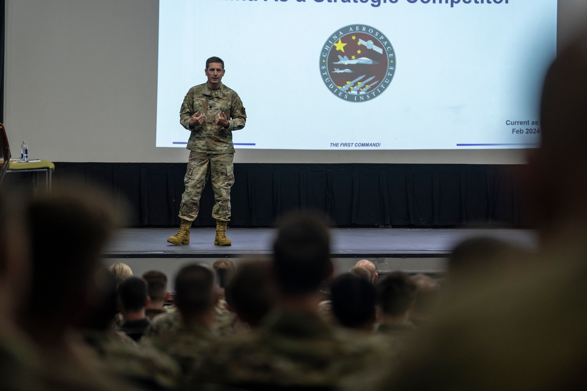 U.S. Air Force Lt. Col. Dustin Burleson, China Aerospace Studies Institute deputy director briefs Airmen at Moody Air Force Base, Georgia, March 22, 2024. CASI conducts primary source research and translation on all topics relevant to Chinese aerospace, including air, space, cyber, and missile-related fields and civilian-sector work. (U.S. Air Force photo by Senior Airman Deanna Muir)