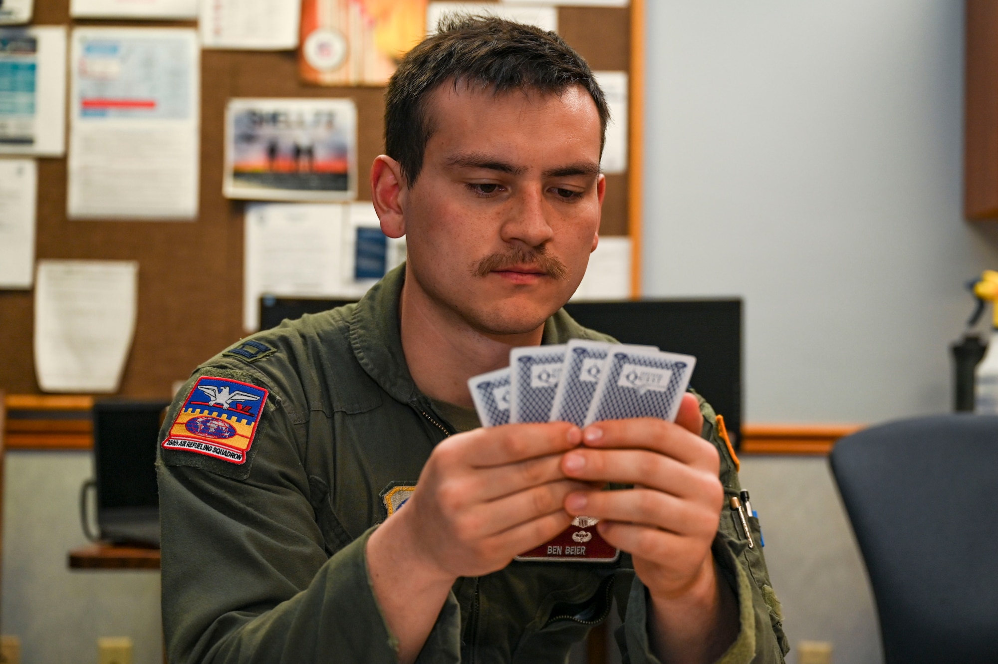 An Airman plays cards