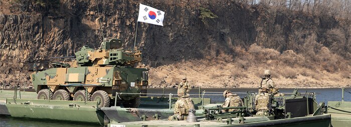 240314-Z-GO106-1008 SOUTH KOREA (March 14, 2024) Republic of Korea Army soldiers operating a tactical vehicle cross a newly constructed Improved Ribbon Bridge during a wet gap crossing training as a part of the larger exercise Freedom Shield 24, March 14, 2024, in South Korea. As one of the largest training events, FS24, tests participants with complex challenges, facilitated by observer-controllers, and includes comprehensive after-action reviews to ensure constant improvement. (Texas Army National Guard photo by Spc. Joe Cantu, 100th Mobile Public Affairs Detachment)