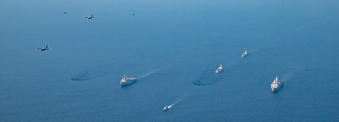 240326-N-JS660-1306 BAY OF BENGAL (March 26, 2024) U.S. Navy San Antonio-class amphibious transport dock ship USS Somerset (LPD 25), Republic of India Austin-class amphibious transport dock ship INS Jalashwa (L41), Shardul-class tank landing ship INS Kesari (L15), Shardul-class tank landing ship INS Airavat (L24) and aircraft maneuver in formation in the Bay of Bengal, Mar. 26, 2024, during Exercise Tiger TRIUMPH 2024. Tiger TRIUMPH is a U.S.-India tri-service amphibious exercise focused on humanitarian assistance and disaster relief readiness and interoperability. (U.S. Navy photo by Mass Communication Specialist 2nd Class Evan Diaz)