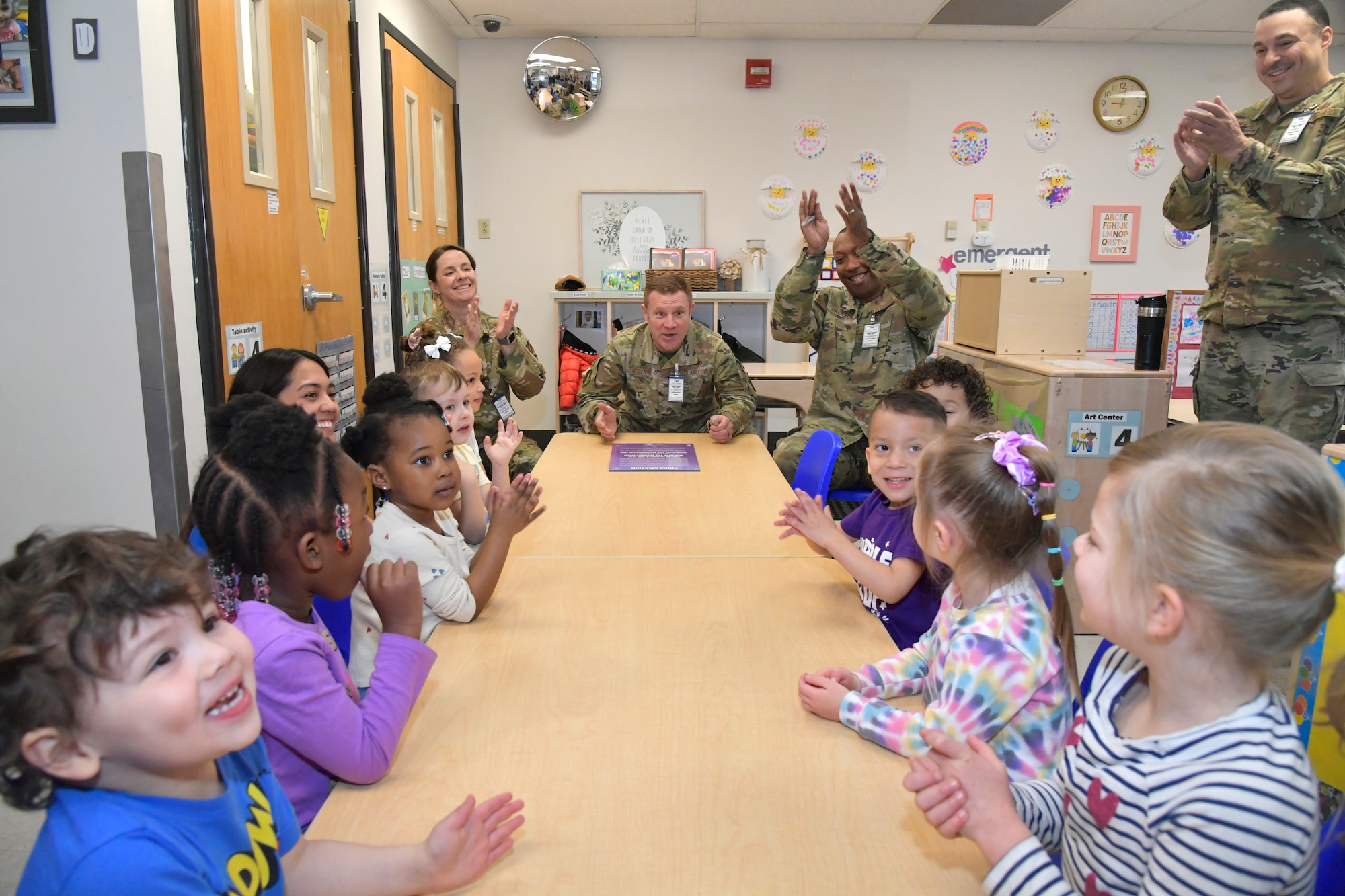 Military leaders celebrate with child development center children
