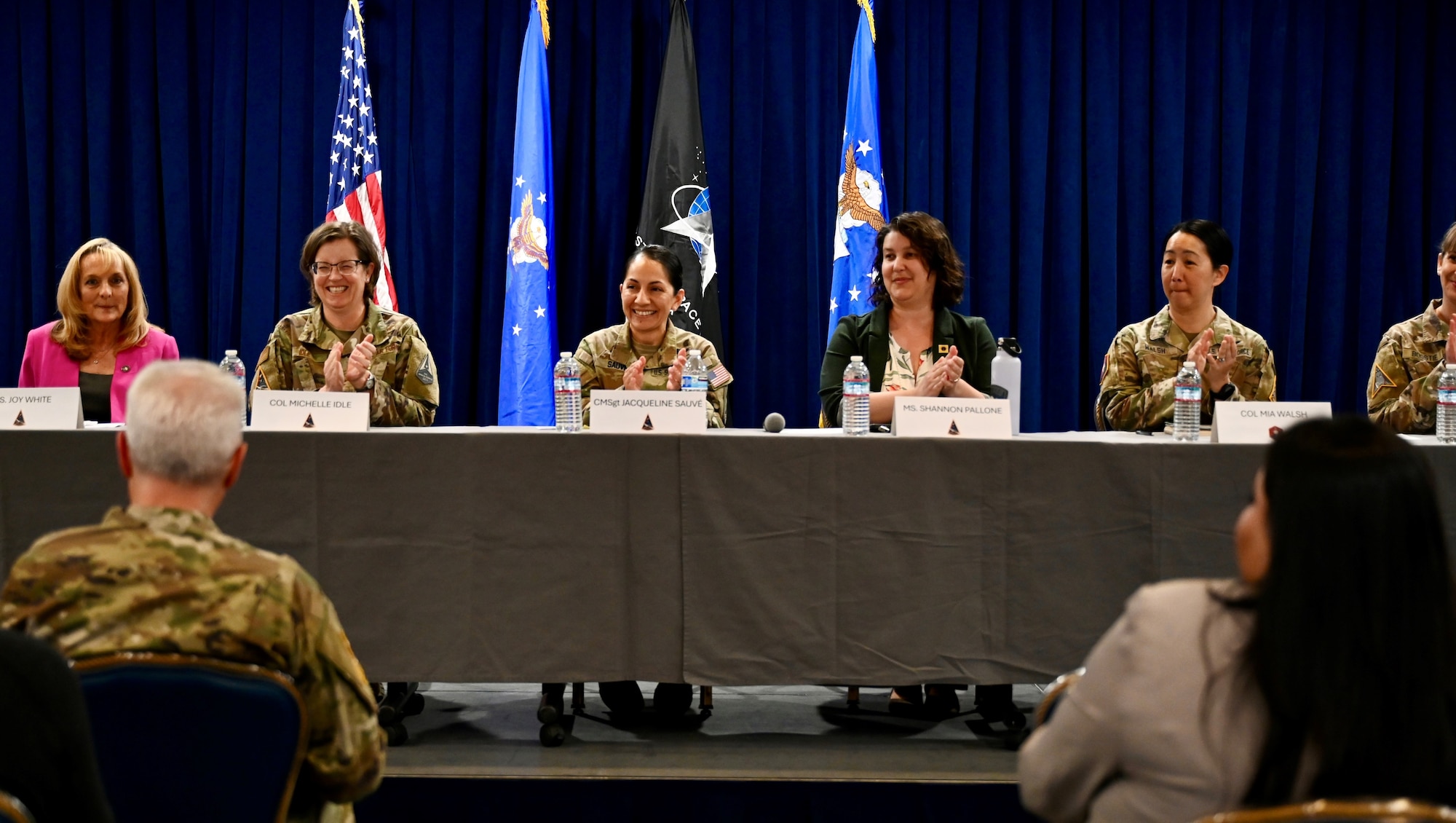 Los Angeles Air Force Base’s Women In Leadership Panel speakers on March 25, 2024 pictured from left to right behind the table: Ms. Joy M. White, Colonel Michele Idle, Chief Master Sergeant Jacqueline Sauvé, Ms. Shannon Pallone; Colonel Mia L. Walsh, and Colonel Heather B. Bogstie. Lieutenant General Philip Garrant, SSC’s Commander, was in the audience, along with many other distinguished guests.