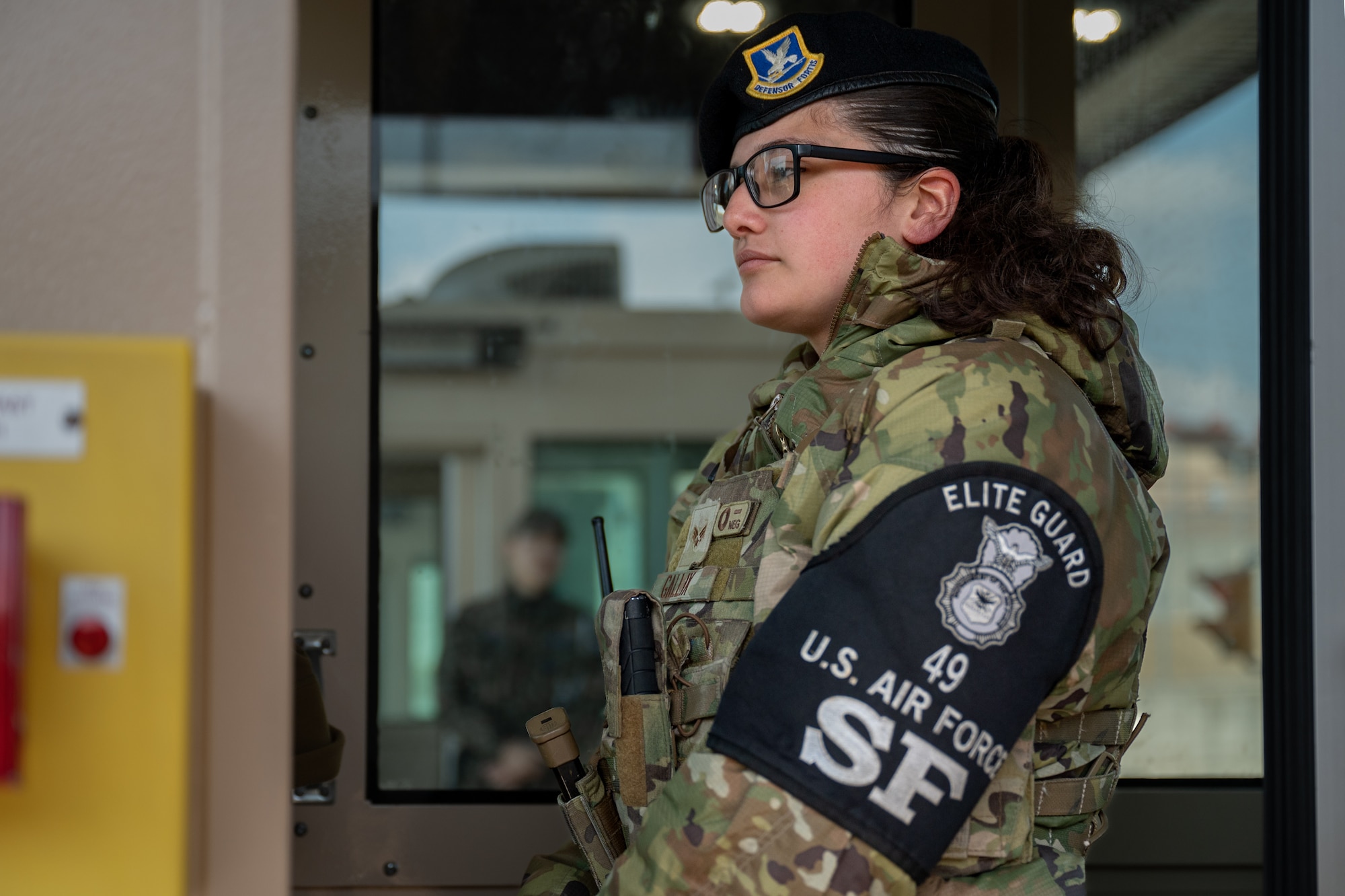 U.S. Air Force Senior Airman Samyra Gallik, 51st Security Forces Squadron elite guard area supervisor, stands guard at Osan Air Base, Republic of Korea, March 21, 2024. Elite guards undergo specialized training to identify forged documents and personal cues indicative of individuals seeking unauthorized entry with potentially harmful intentions into the installation. (U.S. Air Force photo by Senior Airman Brittany Russell)