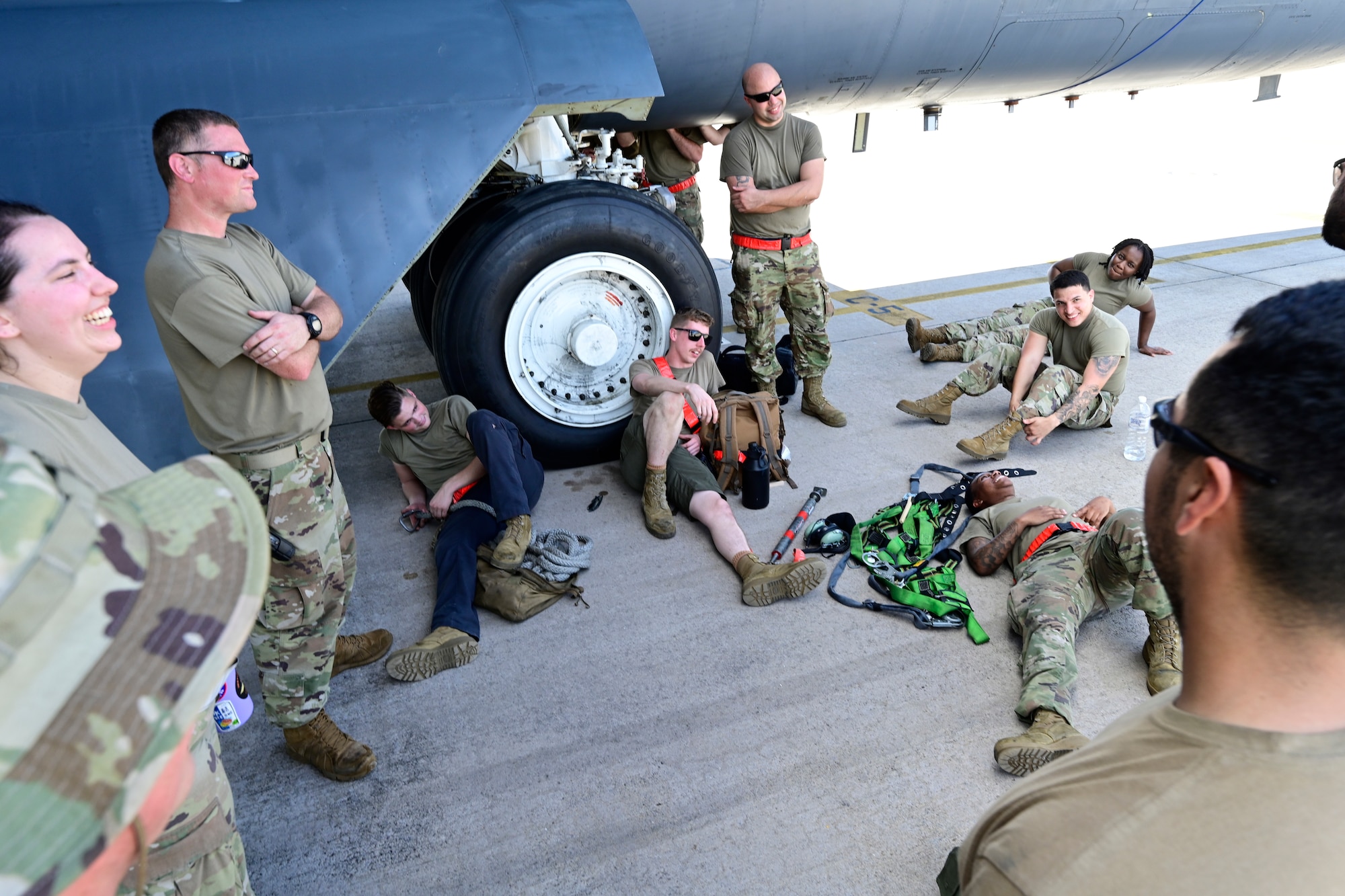 Airmen from the, 96th Aircraft Maintenance Squadron and 2nd Maintenance Squadron, take a break while working on B-52 Stratofortresses assigned to Barksdale Air Force Base, Louisiana, at Navy Support Facility, Diego Garcia in support of a Bomber Task Force mission, March 23, 2024. BTF missions enable crews to maintain a high state of readiness and proficiency and validate our always-ready global strike capability. (U.S. Air Force photo by Master Sgt. Staci Kasischke)