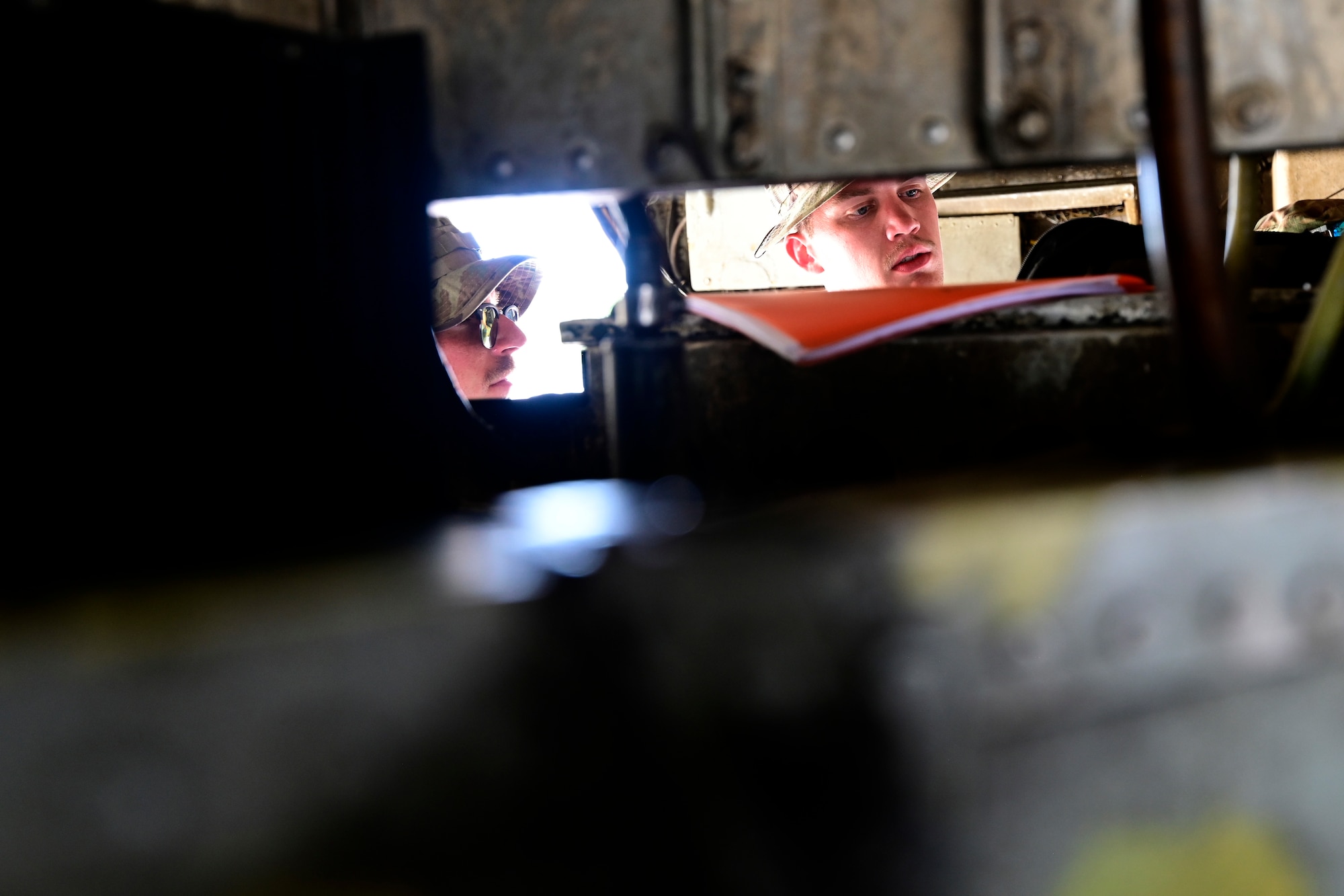 Staff Sgt. David Batchelor and Senior Airman Caleb Wohletz (left to right), both 96th Aircraft Maintenance Squadron crew chiefs, inspect a B-52 Stratofortress assigned to Barksdale Air Force Base, Louisiana, at Navy Support Facility, Diego Garcia in support of a Bomber Task Force mission, March 23, 2024. BTF missions enable crews to maintain a high state of readiness and proficiency and validate our always-ready global strike capability. (U.S. Air Force photo by Master Sgt. Staci Kasischke)