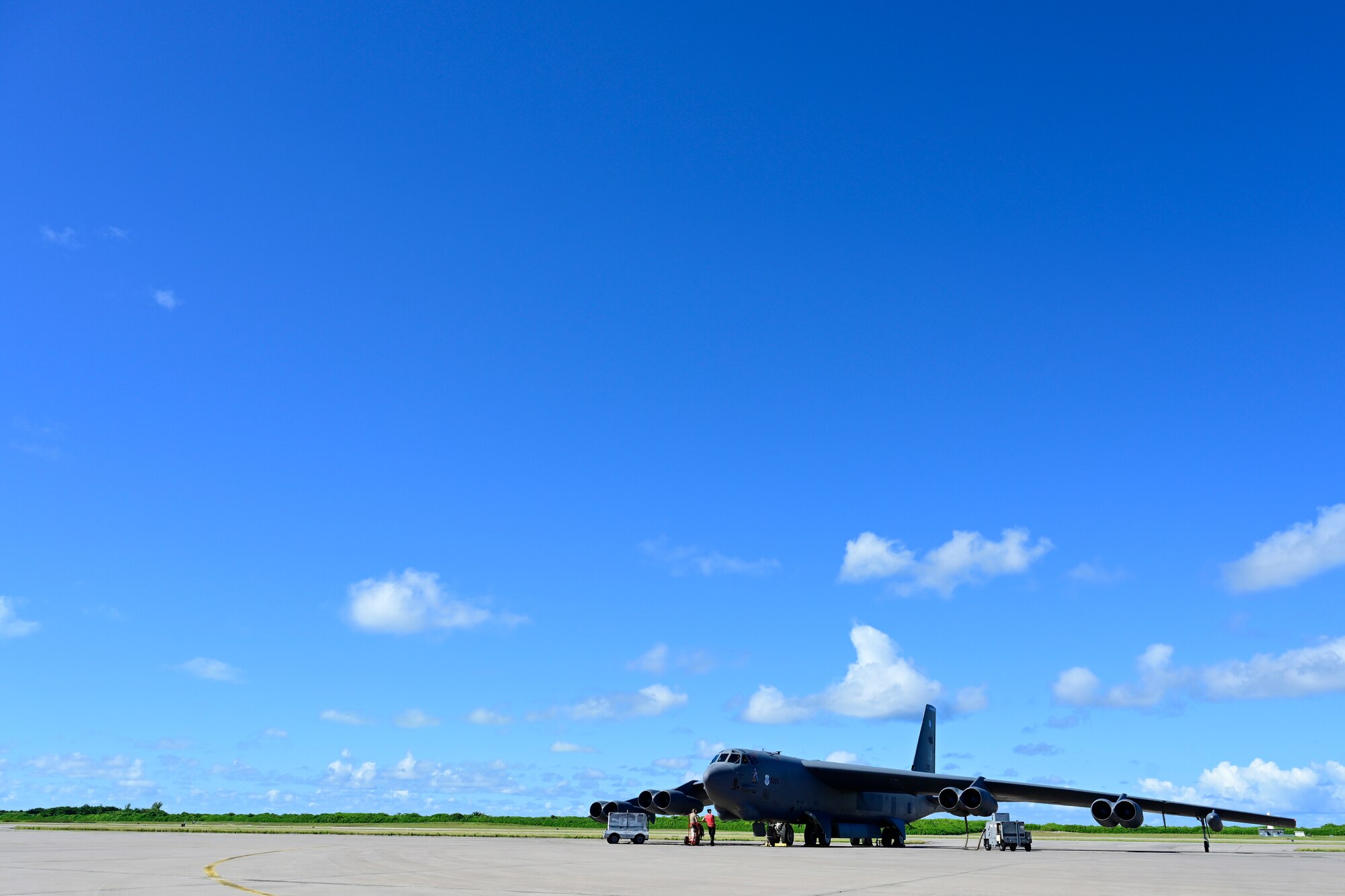 A B-52 Stratofortress assigned to the 2nd Bomb Wing at Barksdale Air Force Base, Louisiana, is prepped prior to taking-off from Navy Support Facility, Diego Garcia in support of a Bomber Task Force mission, March 28, 2024. The U.S. routinely and visibly demonstrates commitment to our allies and partners through the global employment of our military forces.(U.S. Air Force photo by Master Sgt. Staci Kasischke)