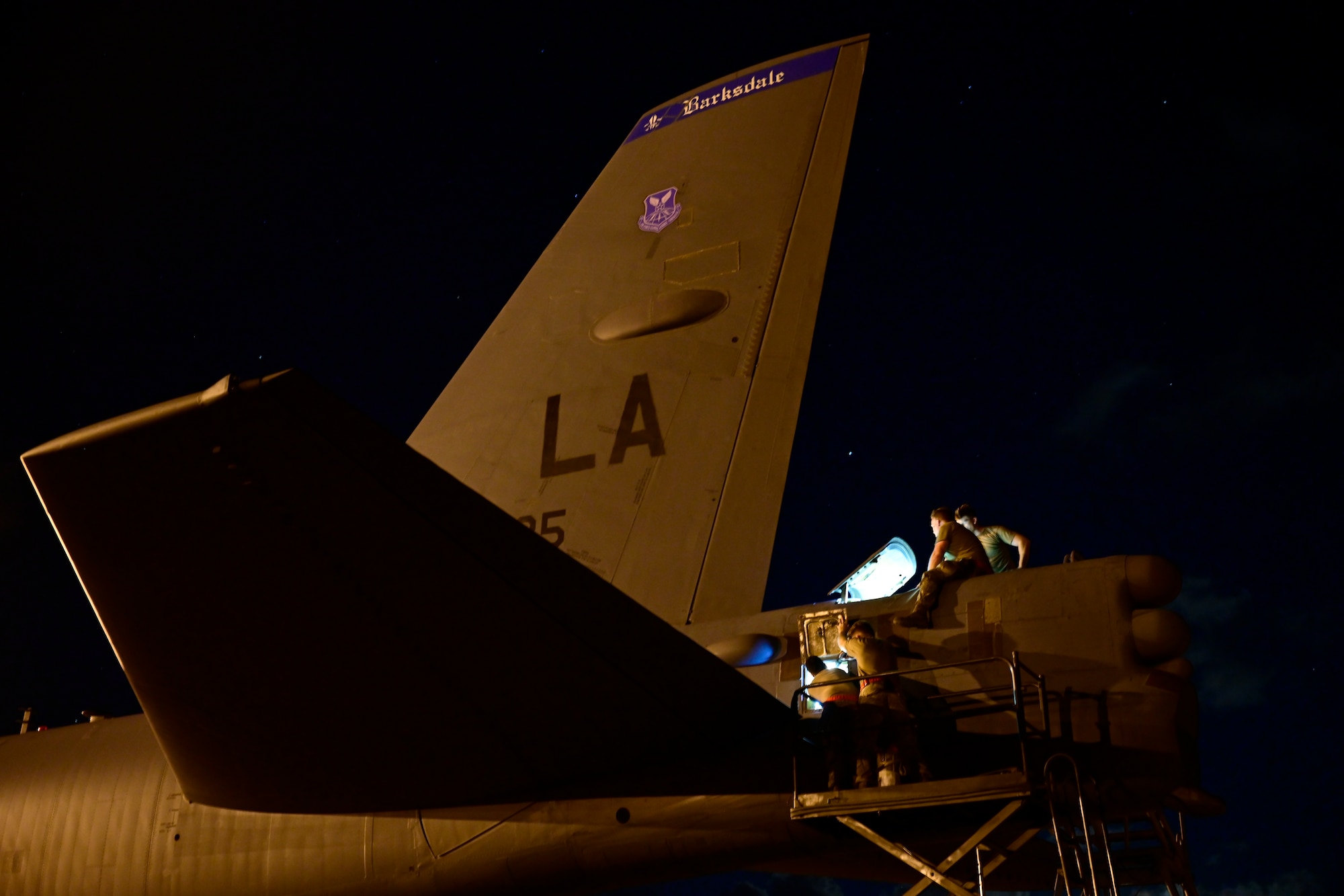 Airmen from the 96th Aircraft Maintenance Squadron work on a B-52 Stratofortress assigned to Barksdale Air Force Base, Louisiana, at Navy Support Facility, Diego Garcia in support of a Bomber Task Force mission, March 28, 2024. BTF missions enable crews to maintain a high state of readiness and proficiency and validate our always-ready global strike capability. (U.S. Air Force photo by Master Sgt. Staci Kasischke)