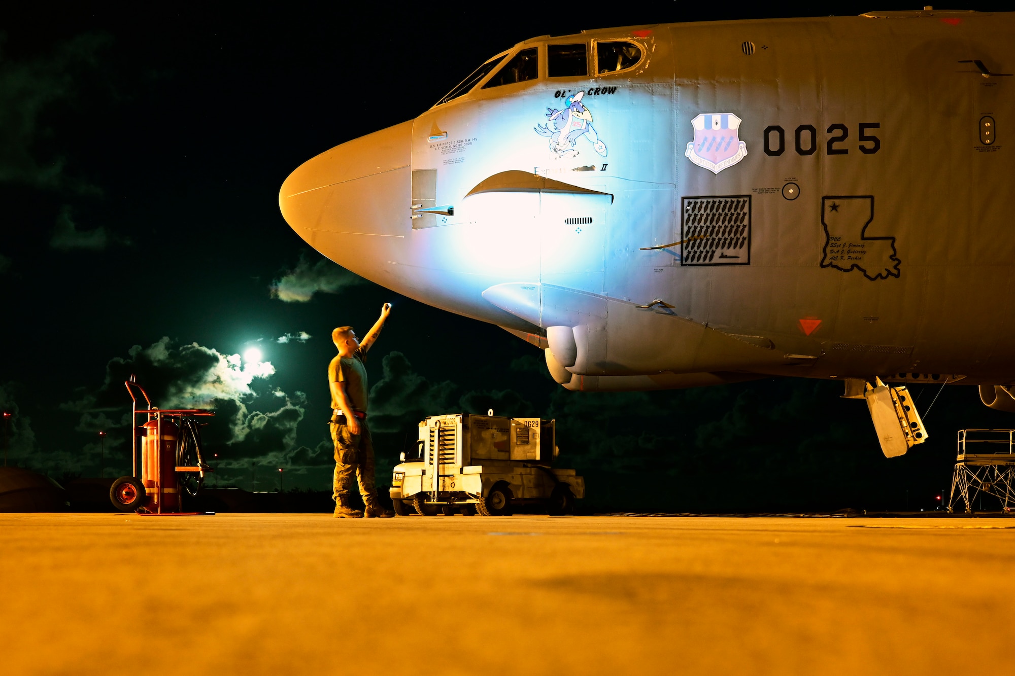 Airman 1st Class Daeden Behling, 96th Aircraft Maintenance Squadron maintainer, works on a B-52 Stratofortress assigned to Barksdale Air Force Base, Louisiana, at Navy Support Facility, Diego Garcia in support of a Bomber Task Force mission, March 28, 2024. BTF missions enable crews to maintain a high state of readiness and proficiency and validate our always-ready global strike capability. (U.S. Air Force photo by Master Sgt. Staci Kasischke)