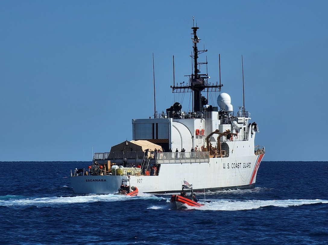 The crew of U.S. Coast Guard Cutter Escanaba (WMEC 907) conducts small boat personnel transfers with the U.S. Coast Guard Cutter Isaac Mayo (WPC 1112), in the South Florida Straits, Feb. 26, 2024. Escanaba’s crew contributed to the interdiction and repatriation of over 100 migrants from Haiti and Cuba while patrolling the Coast Guard Seventh District’s area of responsibility.