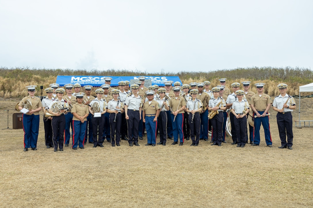 U.S. Marines with the III Marine Expeditionary Force band and the Japan Ground Self-Defense Force Central band pose for a photo during the Reunion of Honor ceremony on Iwo To, Japan, March 30, 2024. The 79th annual Reunion of Honor ceremony commemorates the veterans who fought for their respective countries on this hallowed ground; their battle has inspired future generations to value and maintain peace, security and stability in the Indo-Pacific region and beyond. (U.S. Marine Corps photo by Sgt. Christian M. Garcia)