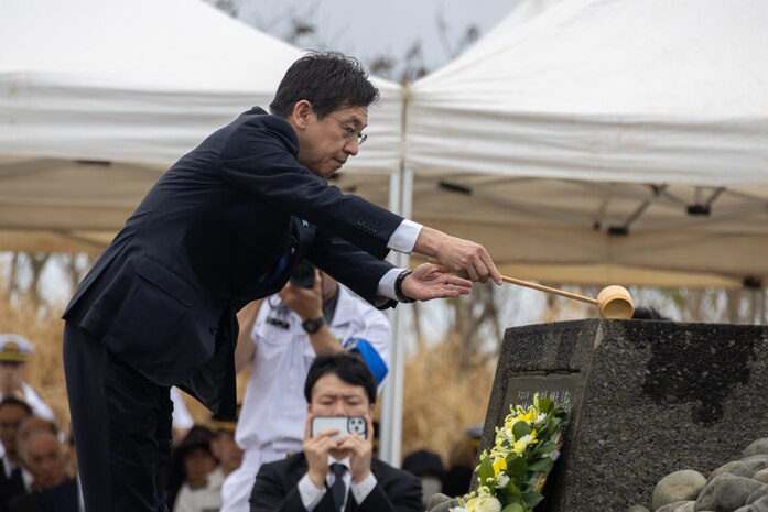 A member of the Iwo Jima Association of Japan performs a water dedication during the Reunion of Honor ceremony on Iwo To, Japan, March 30, 2024. The 79th annual Reunion of Honor ceremony commemorates the veterans who fought for their respective countries on this hallowed ground; their battle has inspired future generations to value and maintain peace, security and stability in the Indo-Pacific region and beyond. (U.S. Marine Corps photo by Sgt. Christian M. Garcia)