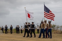 U.S. Marines with the III Marine Expeditionary Force color guard and Japan Ground Self-Defense Force color guard march during the Reunion of Honor ceremony on Iwo To, Japan, March 30, 2024. The 79th annual Reunion of Honor ceremony commemorates the veterans who fought for their respective countries on this hallowed ground; their battle has inspired future generations to value and maintain peace, security and stability in the Indo-Pacific region and beyond. (U.S. Marine Corps photo by Sgt. Christian M. Garcia)
