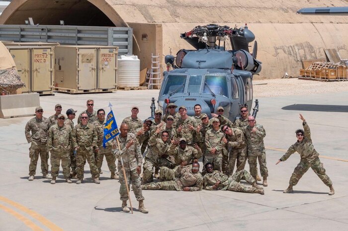 Airmen pose for a group photo.