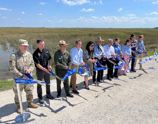 Maj. Cory Bell, U.S. Army Corps of Engineers Deputy District Commander for South Florida joined local, state, federal and tribal officials as well as stakeholders to cut the ribbon on the Central Everglades Planning Project (CEPP) New Water Seepage Barrier Wall Project.