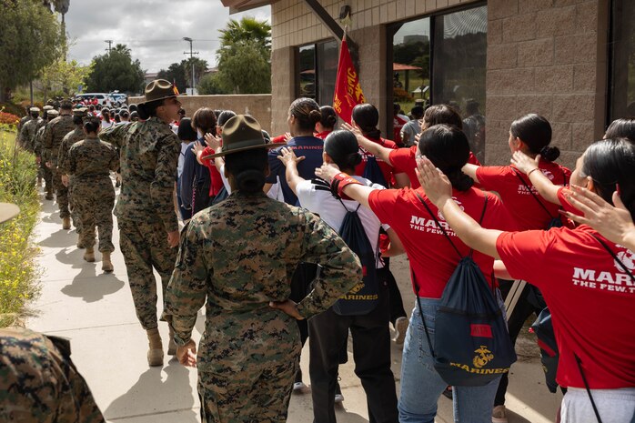 U.S. Marine Corps drill instructors with Marine Corps Recruit Depot San Diego hike with poolees and guests during an all-female pool function at Marine Corps Base Camp Pendleton, Calif., April 27. The pool function consisted of poolees and guests from Recruiting Station Riverside, RS San Diego and RS Orange County. (U.S. Marine Corps photo by Cpl. Fred Garcia)