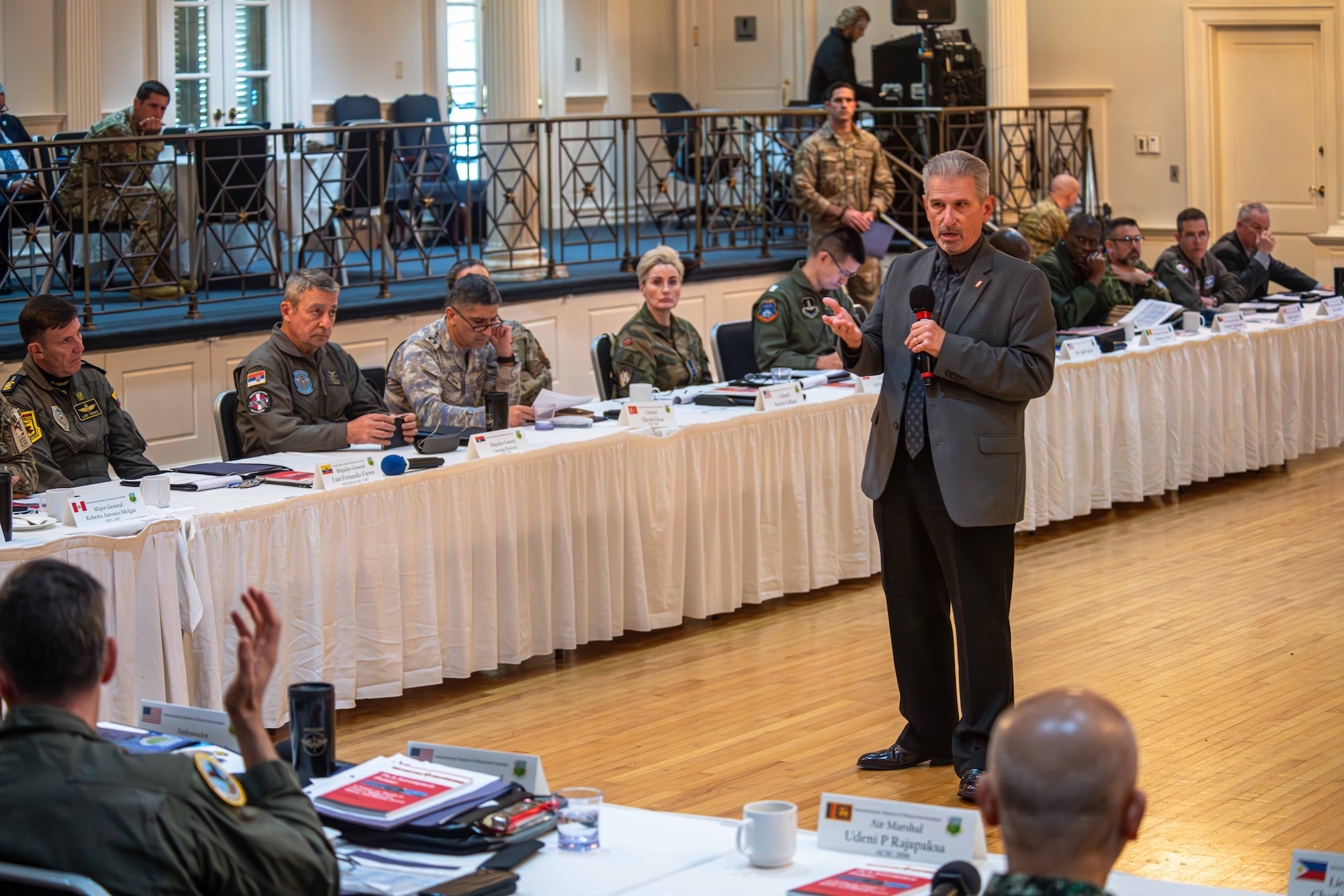 International graduates representing various countries return to the Air University campus, joining Air Force and Department of State leaders to share perspectives on a variety of military topics during the second annual International Alumni of Distinction Seminar at Maxwell Air Force Base. Apr. 17, 2024. Dr. Mark J. Conversino, Provost and Chief Academic Officer, Air University, Maxwell Air Force Base, converses with servicemen about strategic environment, plus shares his knowledge or Russia’s historical and current disposition within such principles. - (U.S. Air Force photo by Sean Ross)