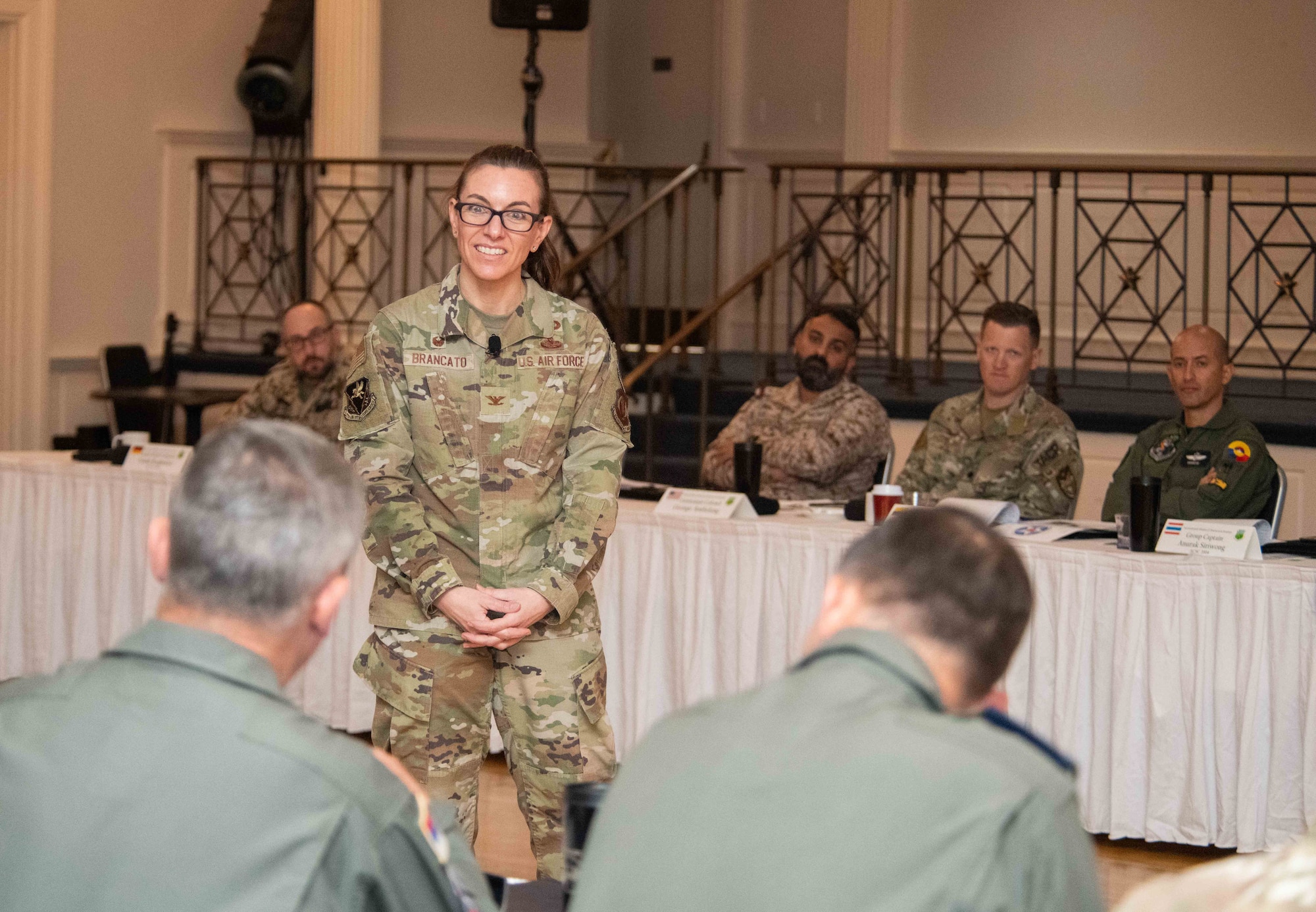 International graduates representing various countries return to the Air University campus, joining Air Force and Department of State leaders to share perspectives on a variety of military topics during the  second annual International Alumni of Distinction Seminar at Maxwell Air Force Base. Apr. 16, 2024. Speaker Col. Micaela Brancato, right, commander, 217th Air Operations Group conducts Q&A discussion . International Officer School hosted the five-day event, which was built around the theme, “Peace Through Partnership” and is designed to enhance and building strategic relationships with partners and allies to maintain the leading edge in global competition.  (US Air Force photo by Darius Hutton)” (U.S. Air Force photo by  Darius Hutton )