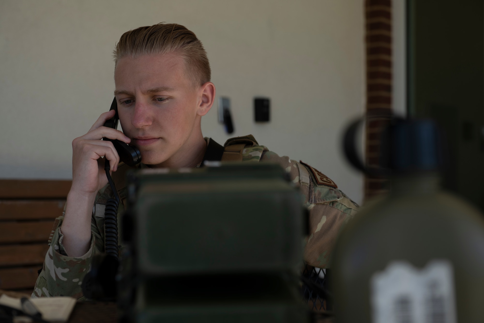 A person talking on the phone on a radio.