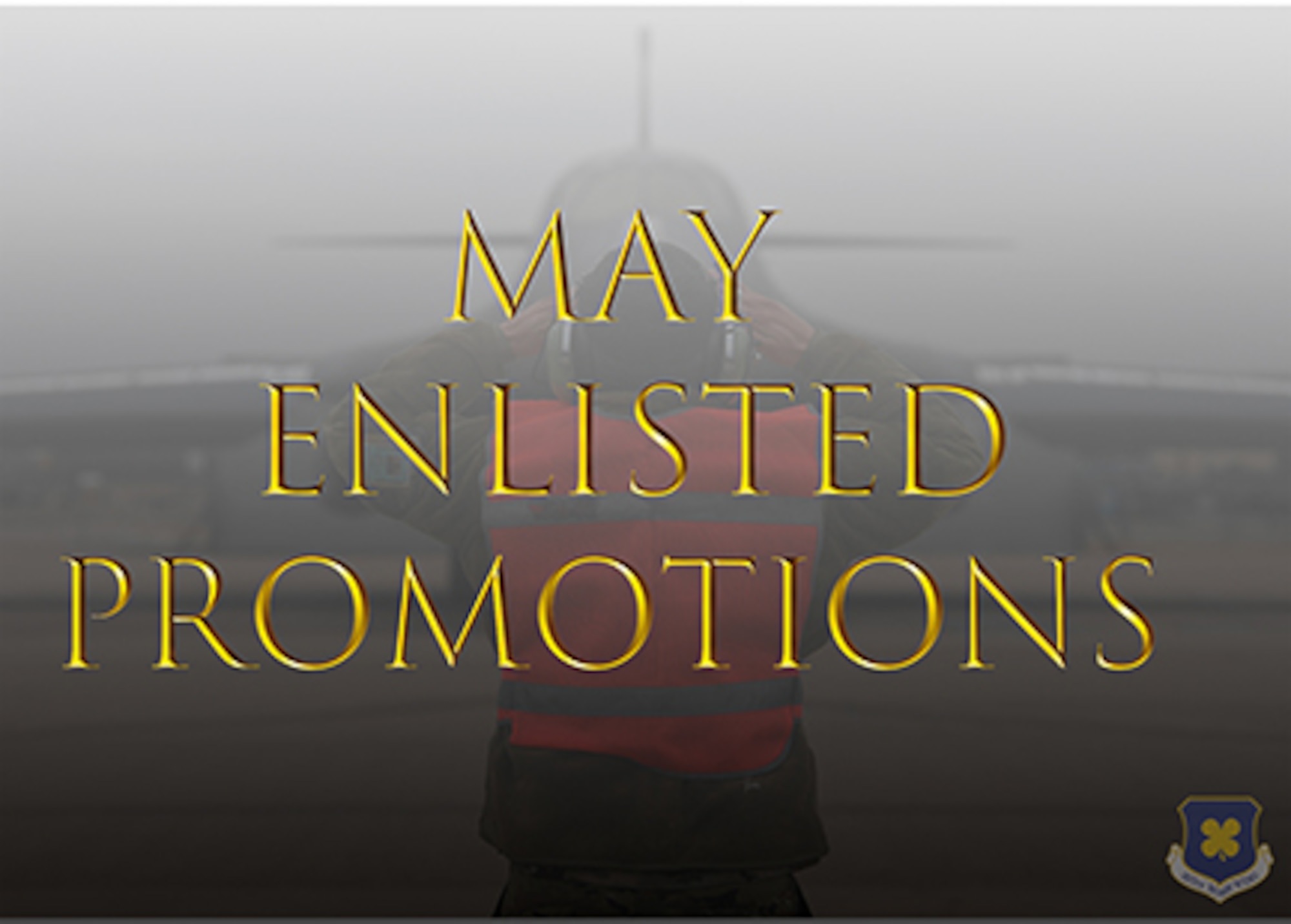 Photo Airman marshalling B-1 Bomber. Text " May Enlisted Promotions" is overlaid.