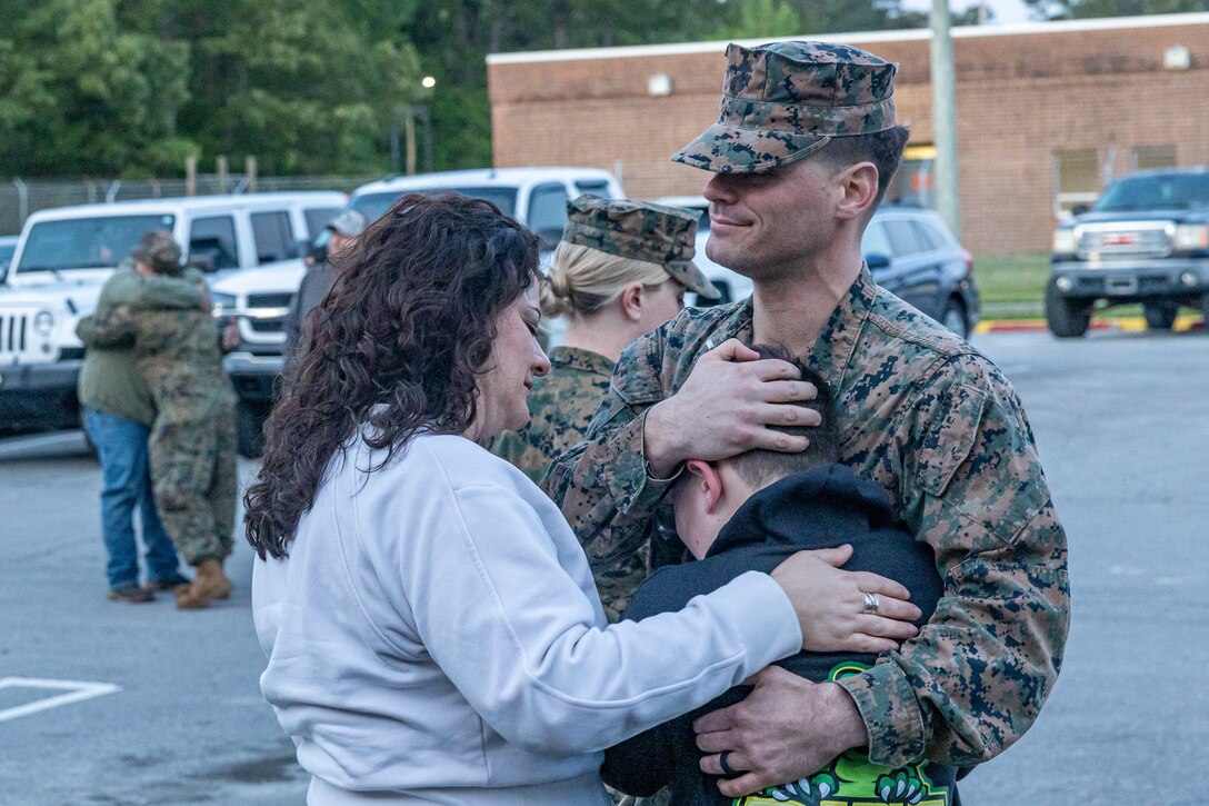U.S. Marine Corps 1st Lt. Gerard Maurer, a logistics officer with Combat Logistics Battalion 6, Combat Logistics Regiment 2, 2nd Marine Logistics Group, reunites with his families after returning from a seven- month deployment as part of Marine Rational Forces Europe area of operations on Camp Lejeune, North Carolina April 24, 2024. CLB 6 returned from their deployment to Finland and Norway which focused on regional engagements by conducting various exercises, arctic cold-weather and mountain warfare training with allied and partner nations, in order to foster interoperability between the United States and its allies.  (U.S. Marine Corps photos by Lance Cpl. Christian Salazar)