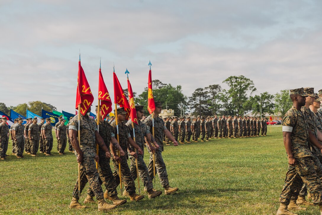 U.S. Marines with 2d Battalion, 2d Marine Regiment, 2d Marine Division march during a change of command ceremony on Camp Lejeune, North Carolina, April 19, 2024. During the ceremony, Lt. Col. Nicholson, the outgoing commander of 2d Battalion, 2d Marine Regiment, relinquished command to Lt. Col. Young. (U.S. Marine Corps photo by Lance Cpl. Allegra Catalan-Dyson)
