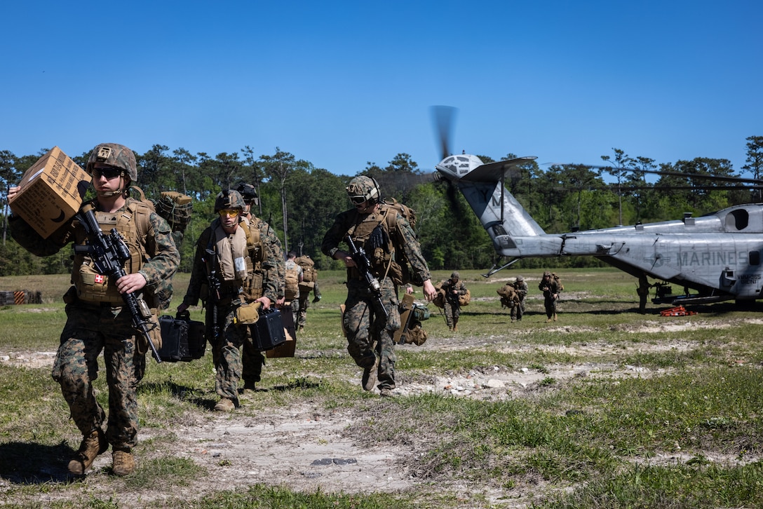 Expeditionary Operations Training Group (EOTG), hosts Marines with the 24th Marine Expeditionary Unit as they conduct an insert for an embassy reinforcement as part of Composite Training Unit Exercise (COMPTUEX) at Marine Corps Base Camp Lejeune, North Carolina, April 14, 2024. The purpose of COMPTUEX is to train and certify the 24th MEU’s Command Element (CE), Aviation Combat Element (ACE), and Ground Combat Element (GCE) and the Logistics Combat Element (LCE) as a capable Marine Air Ground Task Force (MAGTF) that can execute special skills operations along with the Amphibious Ready Group (ARG). COMPTUEX offers an enhanced opportunity for Navy and Marine Corps interoperability training in preparation for the Wasp ARG-MEU’s upcoming deployment. (U.S. Marine Corps Photo by Sgt. Nathan Mitchell)