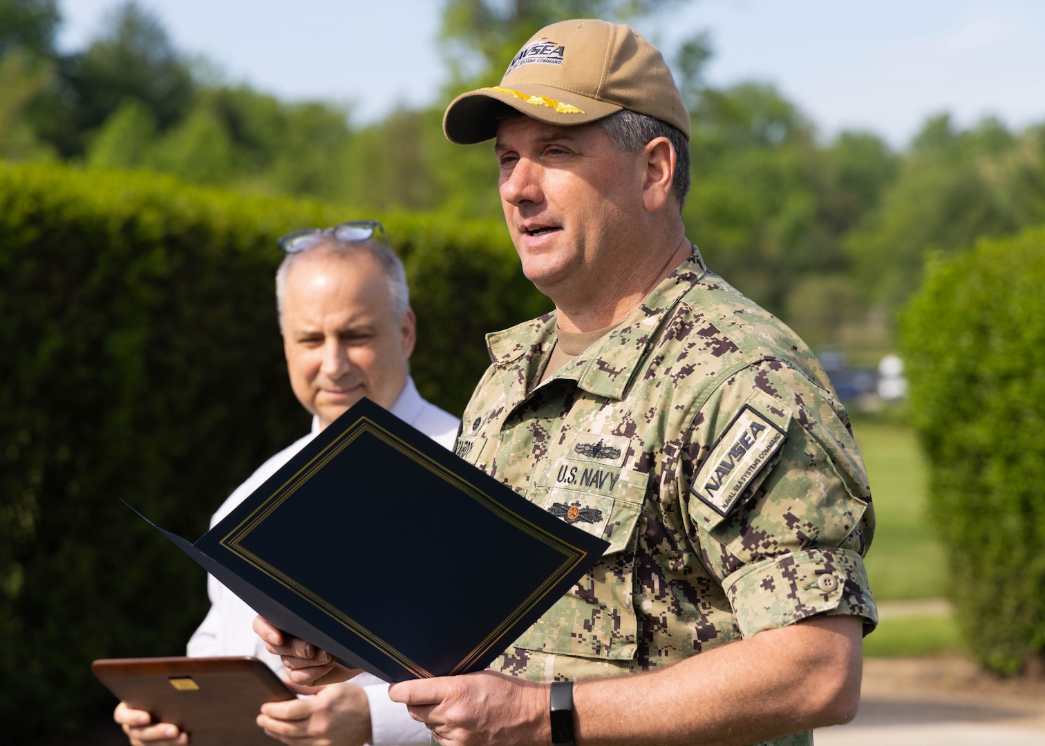 Naval Surface Warfare Center, Carderock Division Commanding Officer Capt. Matthew Tardy reads a complimentary letter from senior Navy officials to the Lithium Battery Safety Certification Team.