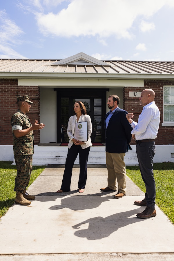From left, U.S. Marine Corps Brig. Gen. Adolfo Garcia Jr., commanding general, Marine Corps Installations East-Marine Corps Base (MCB) Camp Lejeune speaks with Jessica Pierson, underground storage tank section head, David Towler, environmental quality branch head, and Robert Lowder, director, all with Environmental Management Division (EMD), after presenting the 2024 Secretary of the Navy Environmental Award for Environmental Restoration, Installation, on Marine Corps Base Camp Lejeune, North Carolina, May 1, 2024. EMD manages an ecologically diverse installation while continuously ensuring the protection of those living, working, and training on MCB Camp Lejeune. (U.S. Marine Corps photo by Cpl. Jennifer E. Douds)