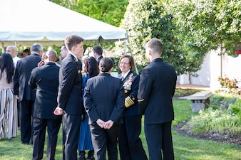 Chief of Naval Operations Adm. Lisa Franchetti speaks with Midshipmen from the U.S. Naval Academy following the second formal parade of the season. Parades are a visual presentation of the military discipline, professionalism and teamwork necessary to succeed as a member of the U.S. Navy and Marine Corps, and have been a part of Naval Academy training since its establishment in 1845. (U.S. Navy photo by Mass Communication Specialist 1st Class William Spears)