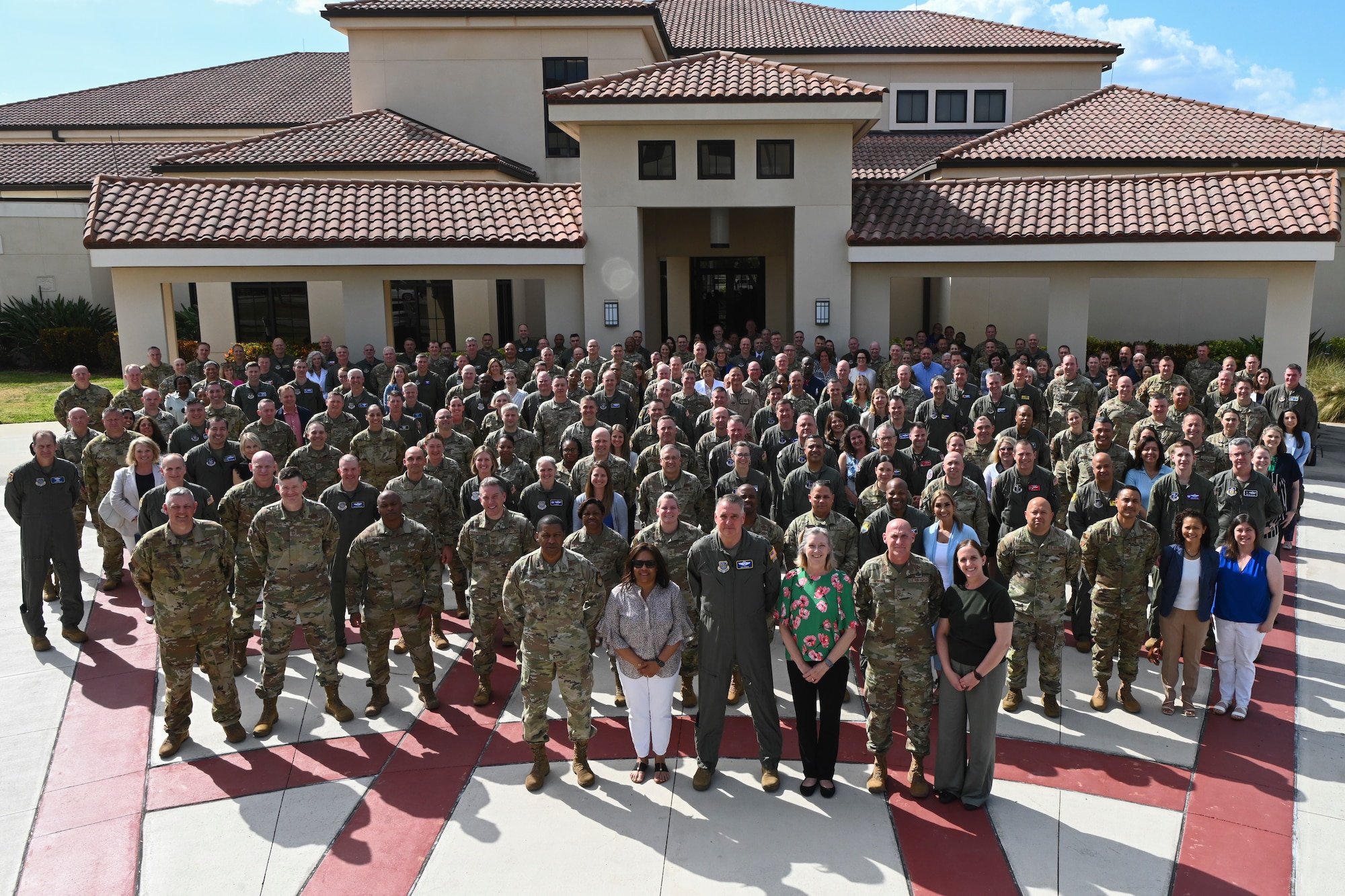 Total Force Mobility Air Force leaders pose for a group photo during Phoenix Rally at MacDill Air Force Base, Florida, April 29, 2024. Spring Phoenix Rally brought together more than 300 Total Force Mobility Air Force leaders and spouses to discuss Warrior Heart, Air Mobility Command's strategy and priorities, and how to work together to ensure the Mobility Air Force is ready to deliver Rapid Global Mobility across the Joint Force. (U.S. Air Force photo by Senior Airman Jessica Do)
