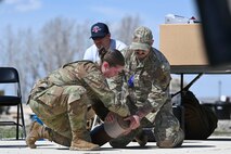 Airmen performing TCCC