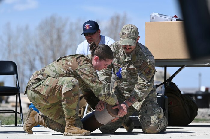 Airmen performing TCCC