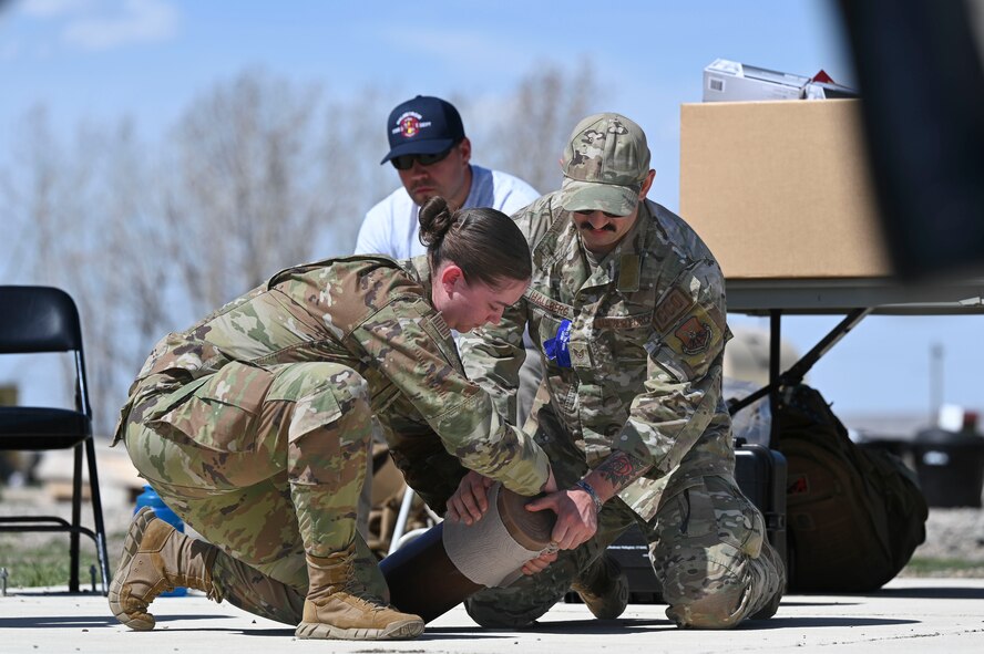 Airmen performing TCCC