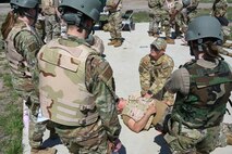 Airman performing TCCC