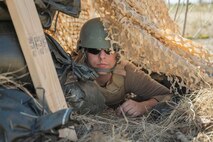 Airman sitting in a tent