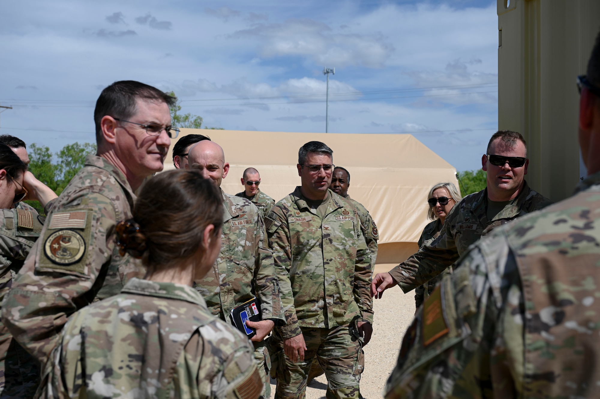 U.S. Air Force Lt. Col. Garrett Williams, 313th Training Squadron commander, escorts the 14N Development Team to an instructional facility on the Joint All Domain Exercise Forward Operations Readiness Generation Exercise training site, Goodfellow Air Force Base, Texas, April 24, 2024. This course aligns with the 313th TRS's mission: to provide world-class mission qualification and advanced intelligence, surveillance and reconnaissance training to develop and inspire professionals for the Department of Defense and our international partners. (U.S. Air Force photo by Airman 1st Class Madison Collier)