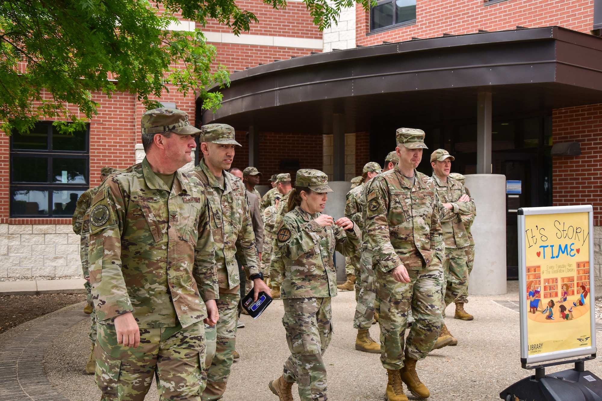 14N Development Team/Functional Advisory Council members exit the Consolidated Learning Center, Goodfellow Air Force Base, Texas, April 24, 2024. The 14N Development Team oversees officer development and talent management to develop the intelligence surveillance reconnaissance workforce deliberately. (U.S. Marine Corps photo by Cpl. Jessica Roeder)