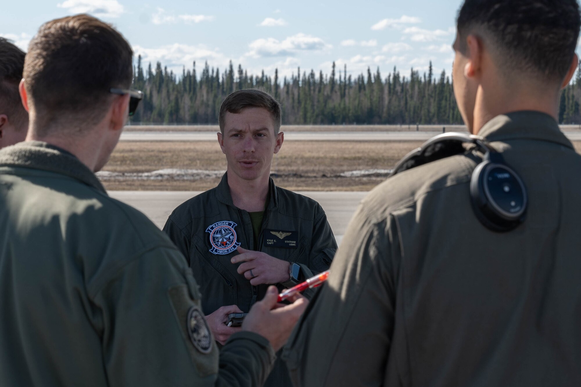 U.S. Marine Corps Capt. Kyle Statham, Marine Aerial Refueler Transport Squadron (VMGR) 234 KC-130J pilot, conducts a pre-flight brief during Red Flag-Alaska 24-1 at Eielson Air Force Base, Alaska, April 25, 2024.