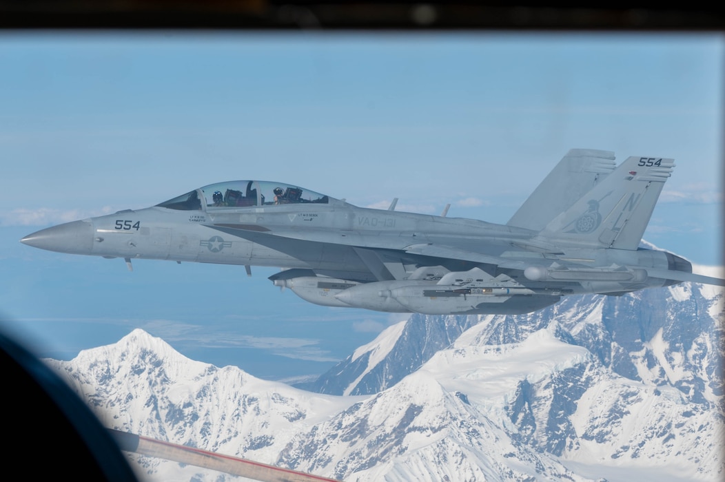 An EA-18G Growler assigned to the Electronic Attack Squadron (VAQ) 131 flies in the Joint Pacific Alaska Range Complex during Red Flag-Alaska 24-1, Alaska, April 25, 2024.