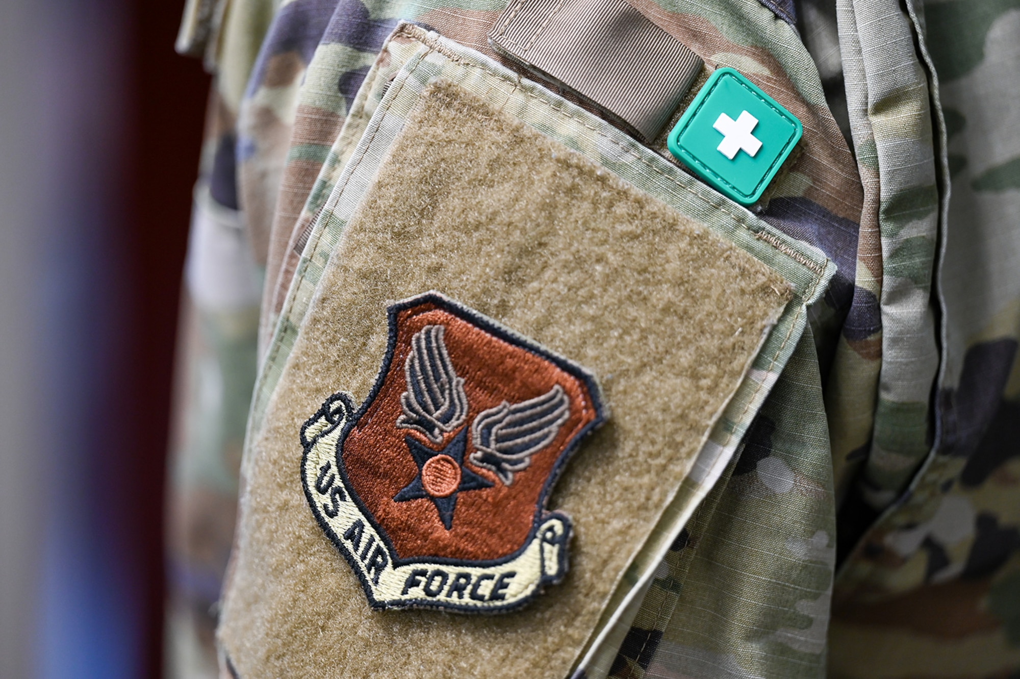 ASIST patch on left arm