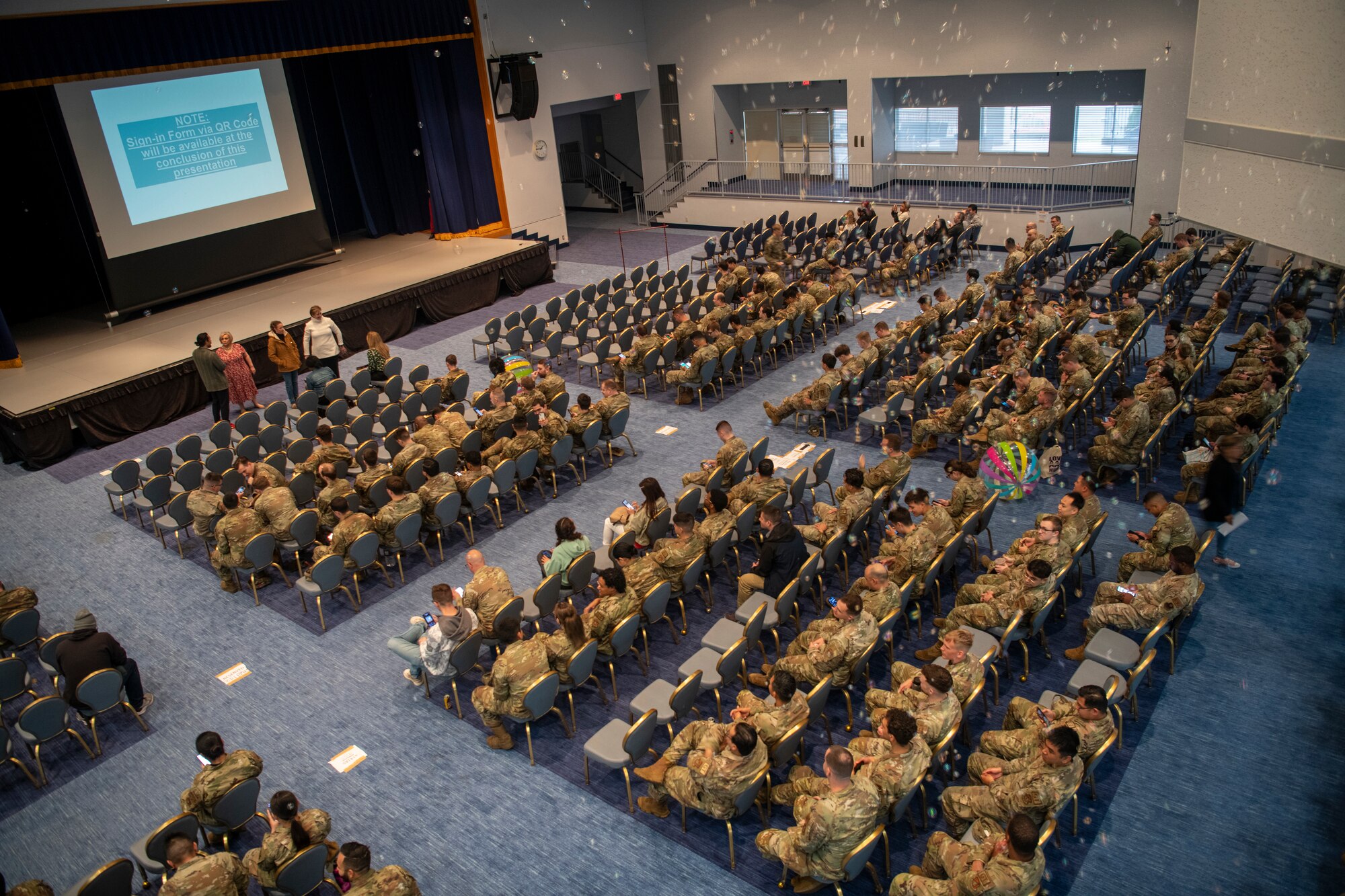 U.S. Air Force Airmen assemble at the Taiyo Community Center for a resiliency day all call.