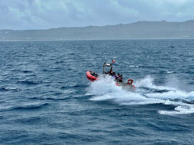 The crew of USCGC Oliver Henry (WPC 1140) take Congressman Sam Graves, Chairman of the House Committee on Transportation and Infrastructure, and Congressman Mike Bost, Chairman of the House Committee on Veterans Affairs, into Apra Harbor, Guam, aboard the small boat on April 26, 2024. The delegation also toured critical infrastructure sites, including the damaged glass breakwater and the Port Authority of Guam, from the cutter and the cutter small boat. These sites are essential for military readiness, impact shipping routes, and influence the economic activity and cost of goods in the Marianas. (U.S. Coast Guard photo by Chief Warrant Officer Sara Muir)