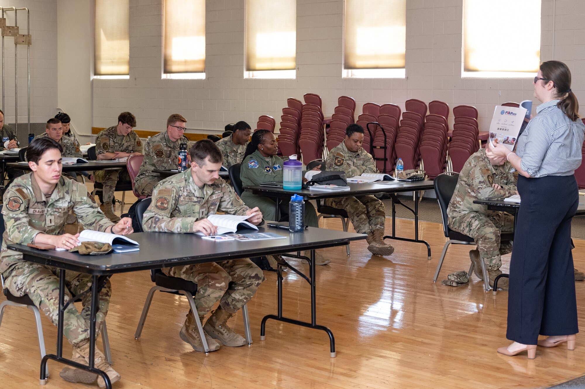 Sarah Gooch, Department of Defense program analyst, speaks with Airmen during a Voting Assistance Officer workshop at Holloman Air Force Base, New Mexico April 24, 2024.