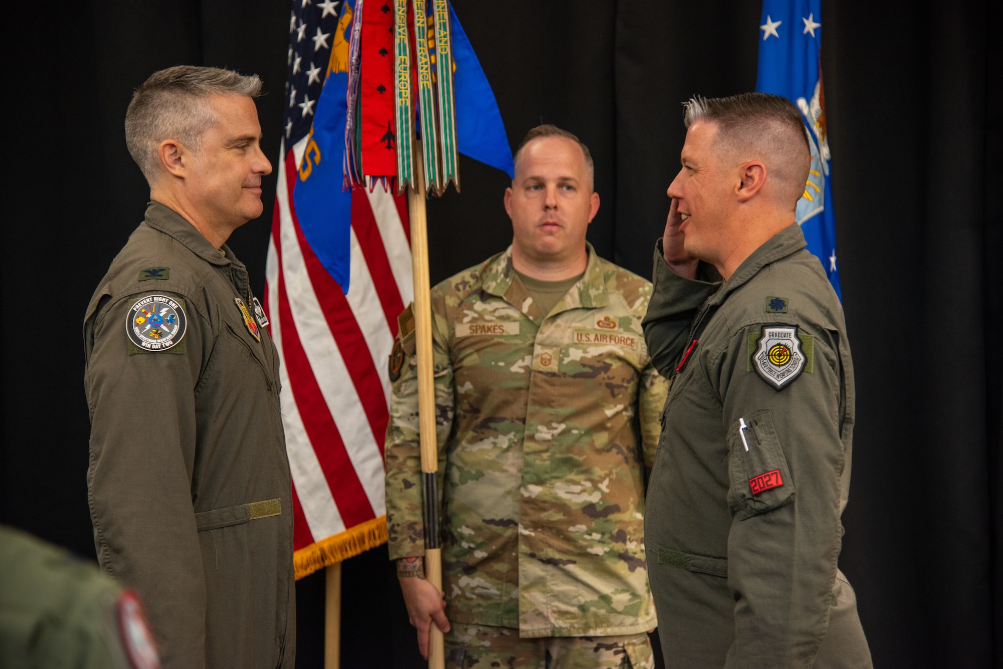 U.S. Air Force Col. Andrew J. Finkler, 850th Spectrum Warfare Group commander, left, is saluted by U.S. Air Force Lt. Col. Charles A. Friesz, 563rd Electronic Warfare Squadron commander, as he assumes command of 563rd EWS at the unit’s reactivation ceremony, San Antonio, Texas, April 25, 2024. The 563rd EWS lineage dates back to WWII, and includes the “Wild Weasel” mission established during the Vietnam War. The squadron now aims to become a digitally-native organization based in 21st-century processes, practices and technologies to execute electromagnetic spectrum operations support for the Air Force. (U.S. Air Force photo by Jarrod M. Vickers)