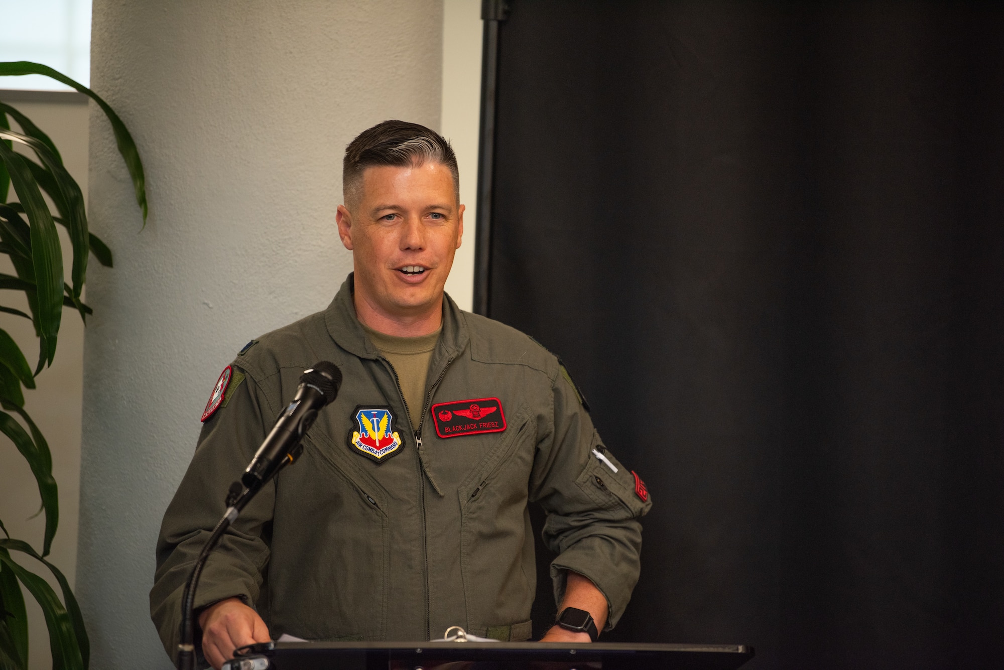 U.S. Air Force Lt. Col. Charles A. Friesz, 563rd Electronic Warfare Squadron commander, speaks during the reactivation ceremony for 563rd EWS, San Antonio, Texas, April 25, 2024. Friesz is the first commander of the unit since its deactivation in 2010. The 563rd EWS was previously dedicated to electronic warfare and combat system officer training and will now perform software development to support electromagnetic warfare capabilities for the Air Force. (U.S. Air Force photo by Jarrod M. Vickers)