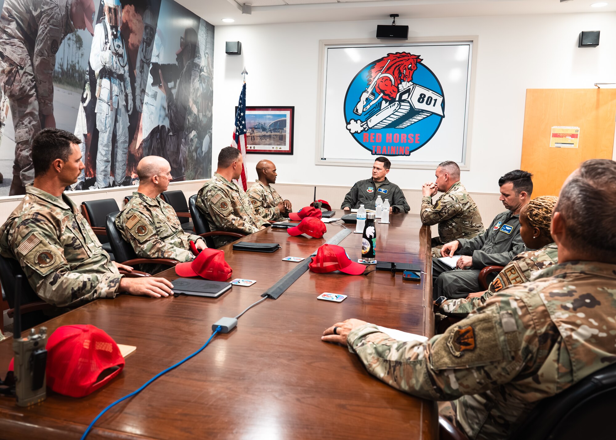 U.S. Air Force Maj. Gen. David B. Lyons speaks with Airmen from the 801st Rapid Engineer Deployable Heavy Operation Repair Squadron Engineers Training Squadron