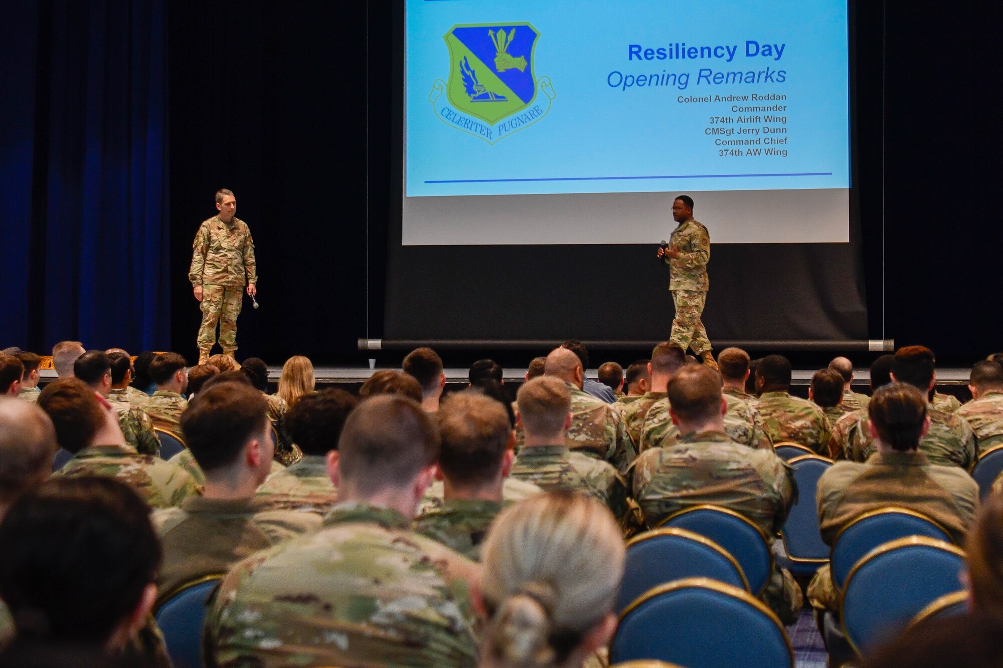 From the left, U.S. Air Force Col. Andrew Roddan, 374th Airlift Wing commander, and Chief Master Sgt. Jerry Dunn, 374th AW command chief, give opening remarks.