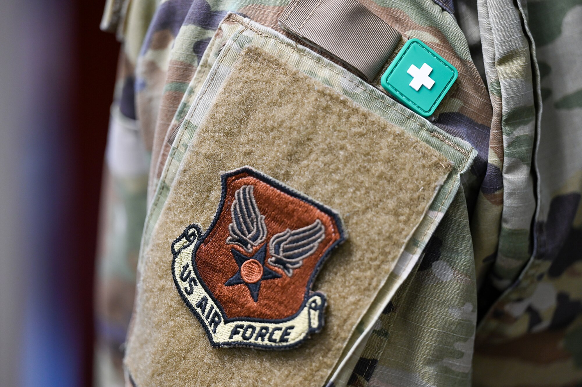ASIST patch on left arm