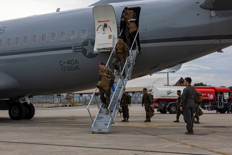 U.S. Marines and Sailors with Marine Rotational Force – Darwin 24.3 offload from a C-40A assigned to Marine Transport Squadron 1, Marine Aircraft Group 41, 4th Marine Aircraft Wing, Marine Forces Reserve, in preparation for a humanitarian aid and disaster relief exercise at Jacksons International Airport, Port Moresby, Papua New Guinea, April 30, 2024.